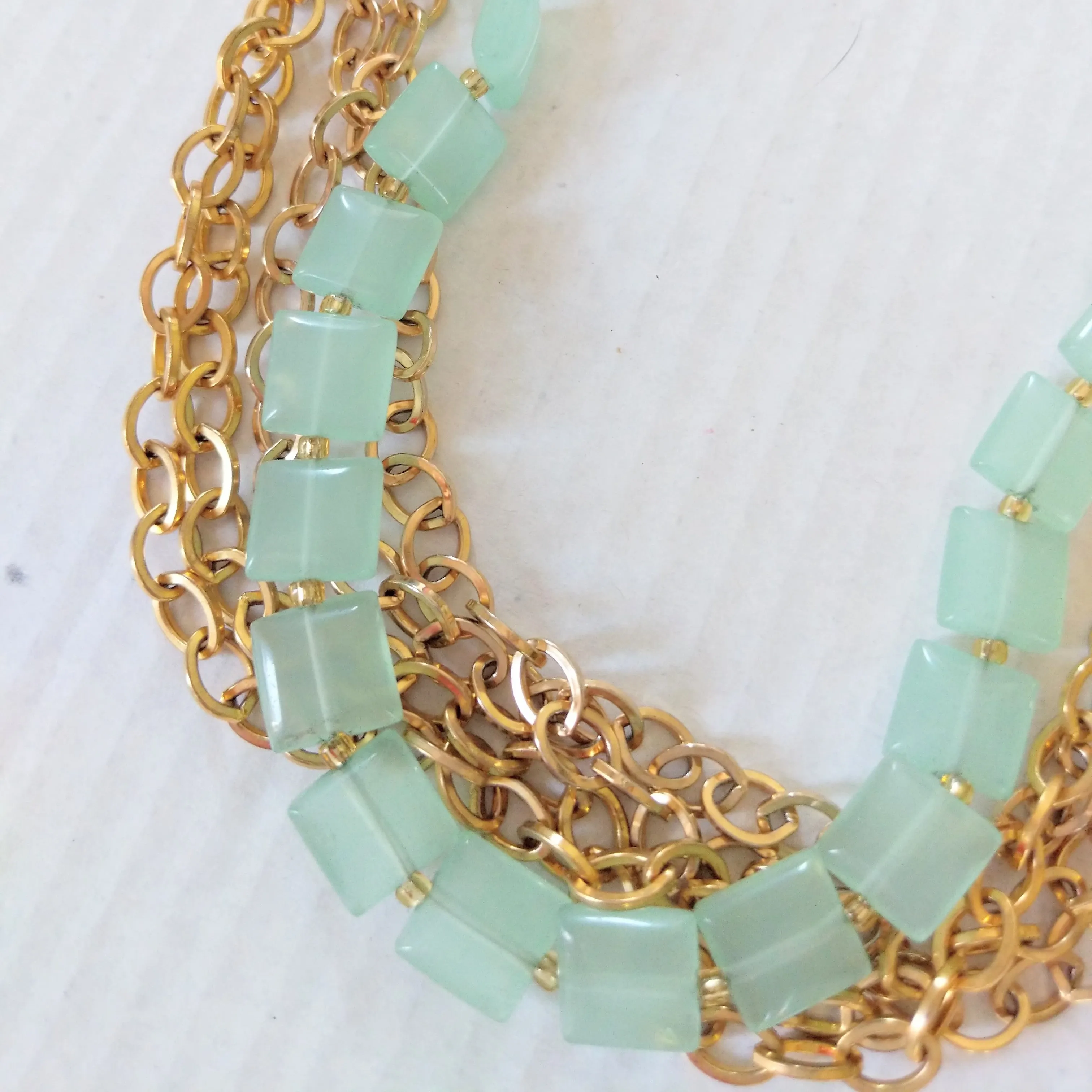 Gold Multi Strand Necklace with Green Beads