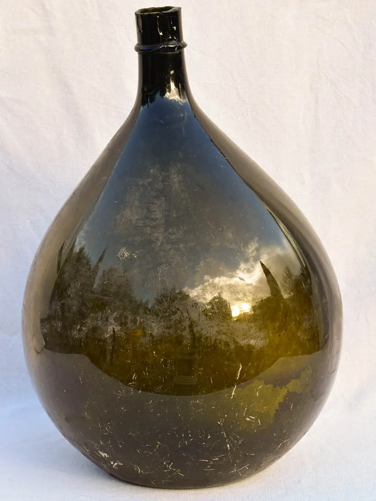 Very large early 20th Century Italian demijohn bottle - dark green / black 27½"